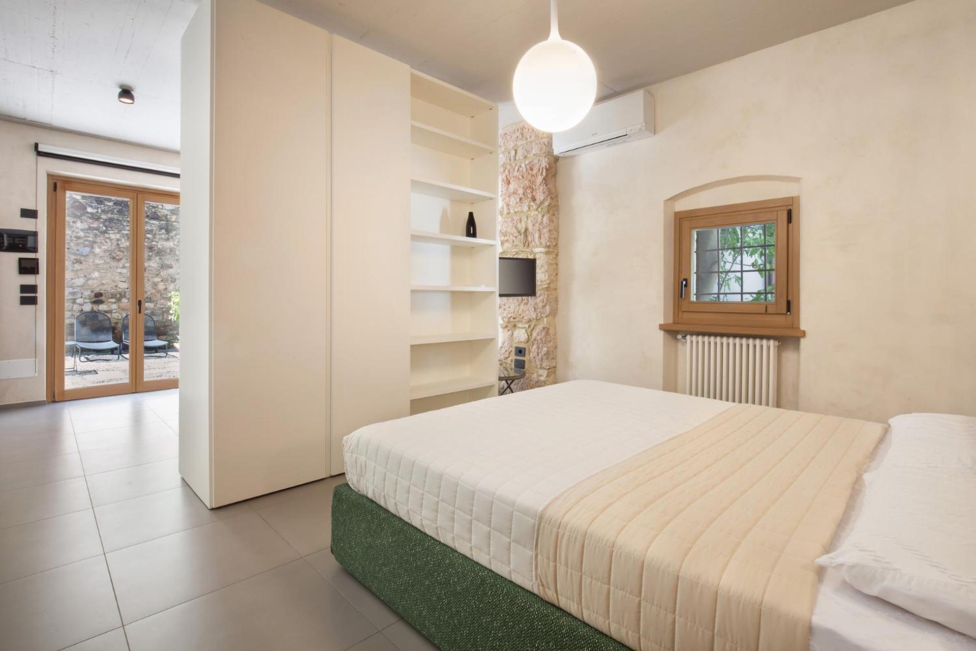 Апарт отель Residenza Vedovelli Торри-дель-Бенако Экстерьер фото