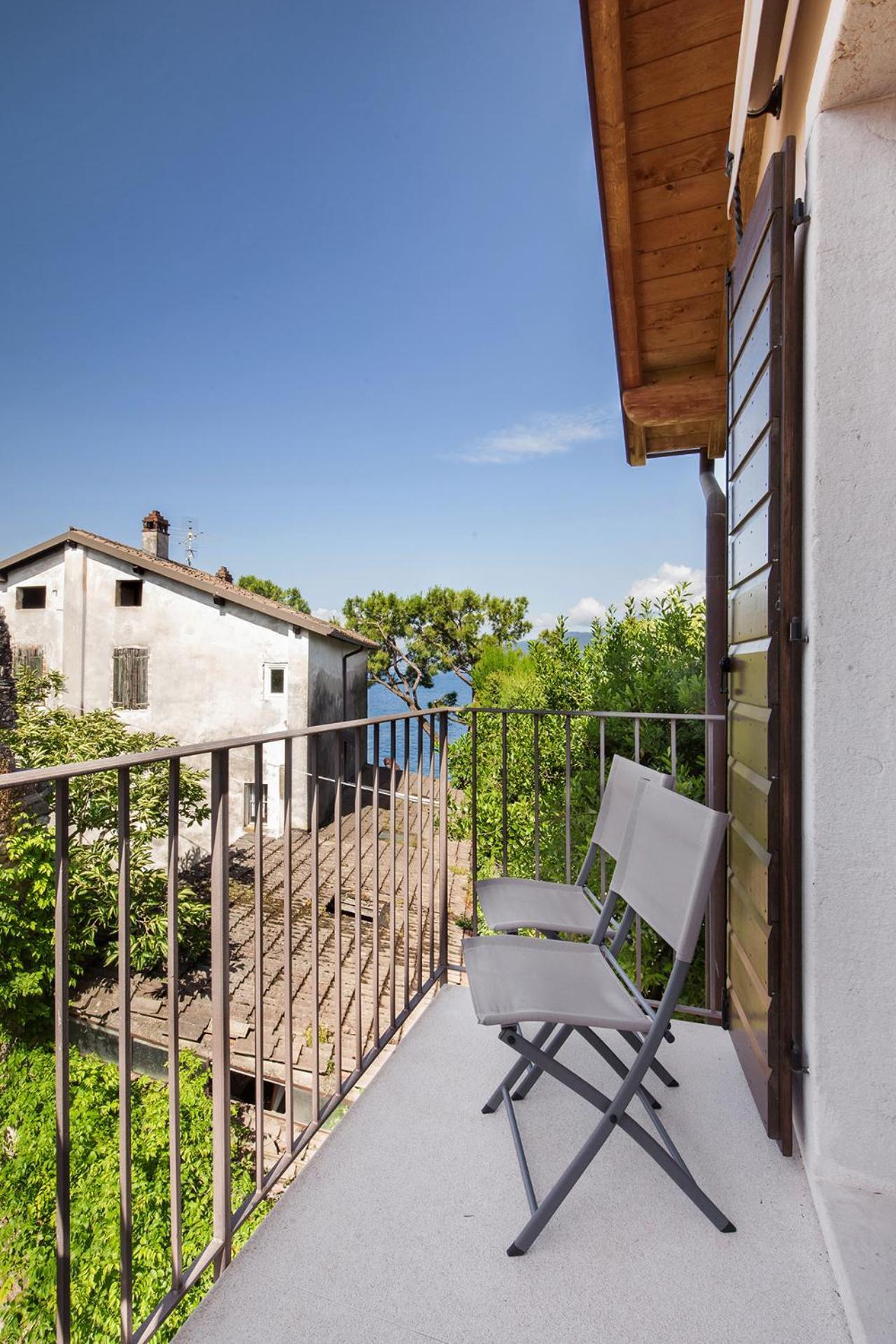 Апарт отель Residenza Vedovelli Торри-дель-Бенако Экстерьер фото
